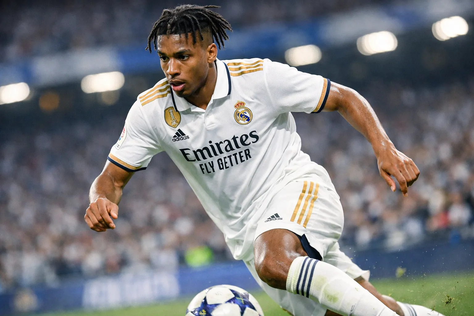 A highly detailed and recognizable representation of Michael Olise, a technical winger with short twists, wearing a Real Madrid home kit in a dynamic attacking pose.
