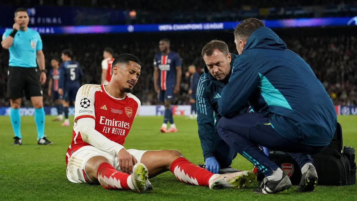 William Saliba receives medical attention after Arsenal's Champions League final defeat to PSG, with injury concerns growing