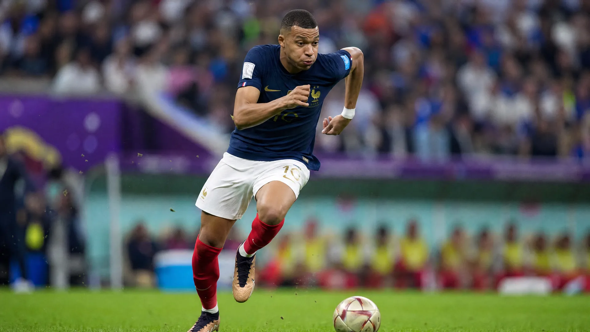 Kylian Mbappe sprinting in France's blue national kit as he targets World Cup 2026 glory after a difficult Real Madrid season