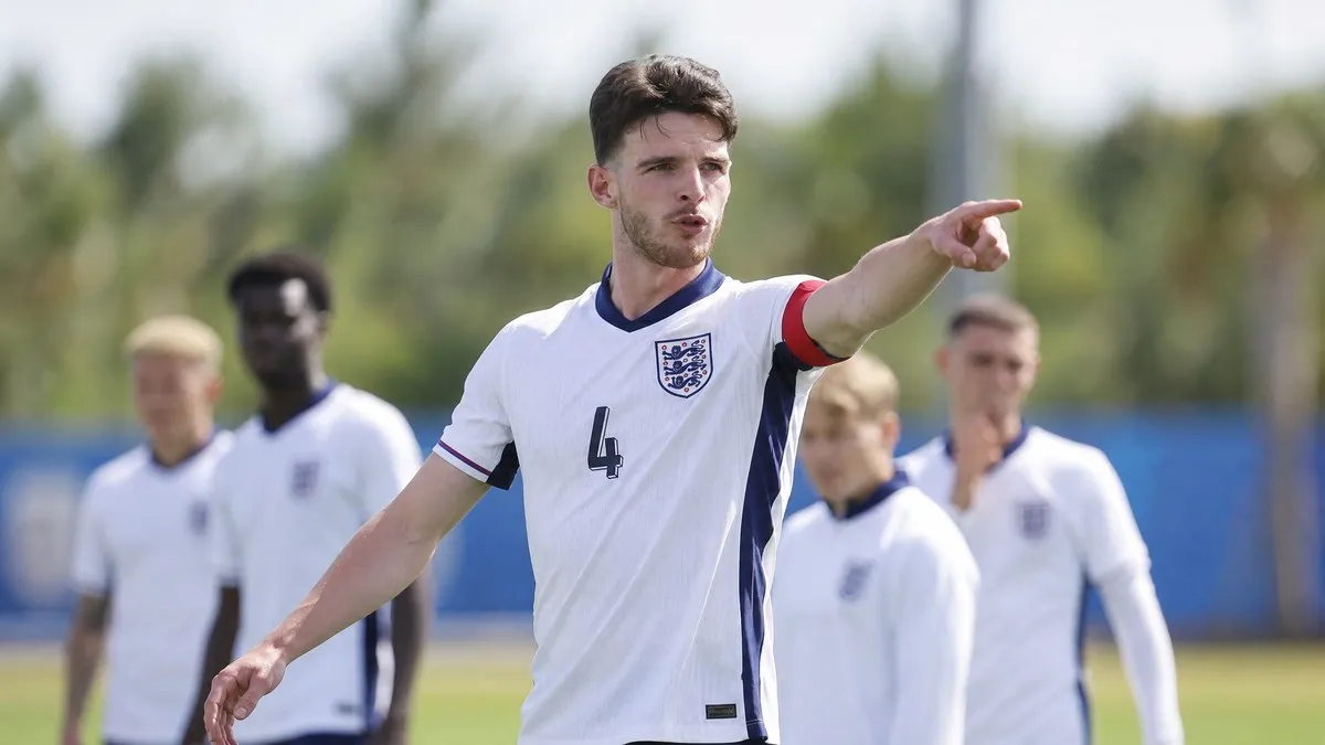 Declan Rice wearing England number 4 kit with vice-captain armband leading training ahead of the World Cup