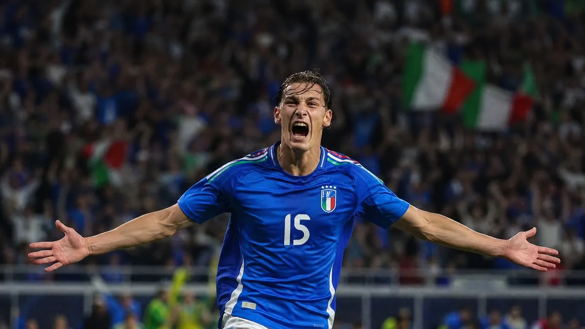 Pio Esposito celebrating in Italy blue kit as Manchester United scout the Inter Milan striker this summer