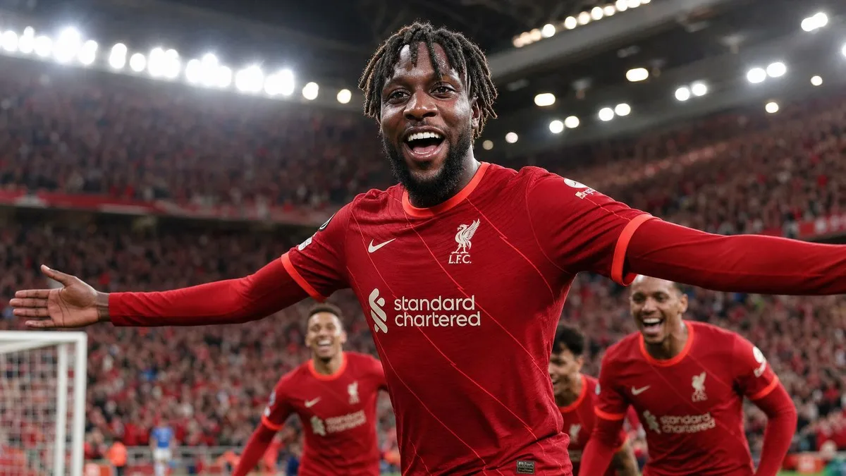 Divock Origi celebrating a goal in Liverpool FC's red kit at Anfield as the cult hero announces his retirement