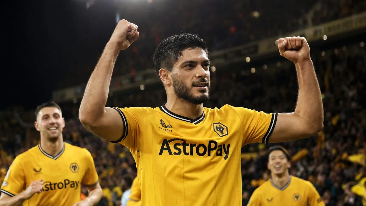 Raul Jimenez celebrating in Wolverhampton Wanderers gold kit at Molineux as he nears a return to Wolves