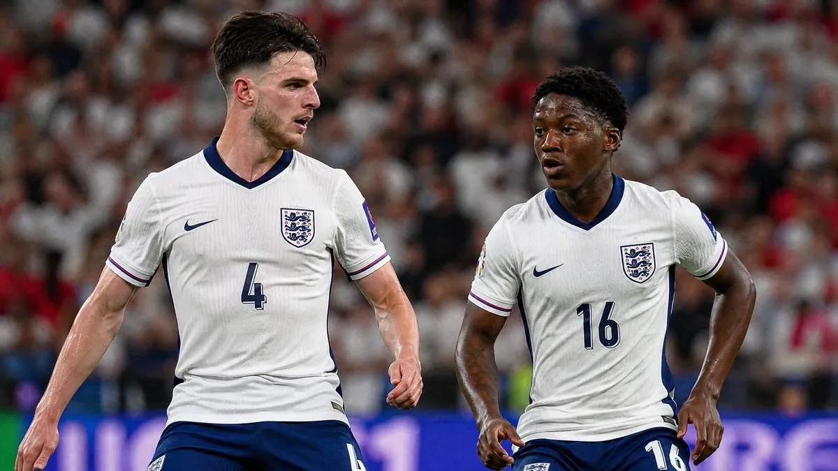 Declan Rice and Kobbie Mainoo in England national team kit during a 2026 World Cup midfield battle