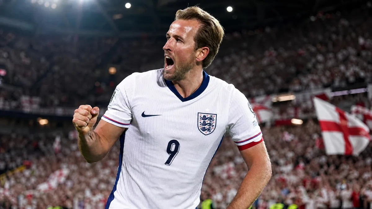 Harry Kane celebrates a goal for England at the 2026 FIFA World Cup, wearing the white England kit