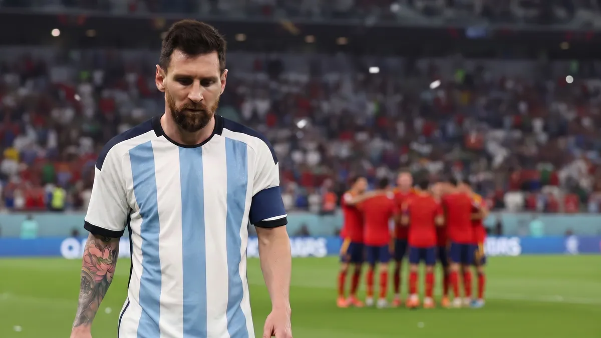 Lionel Messi reflects in Argentina colours after Spain's World Cup final win, marking his international retirement